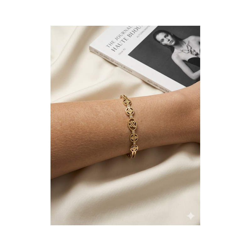 Bracelete no aço inoxidavel banhado a ouro
