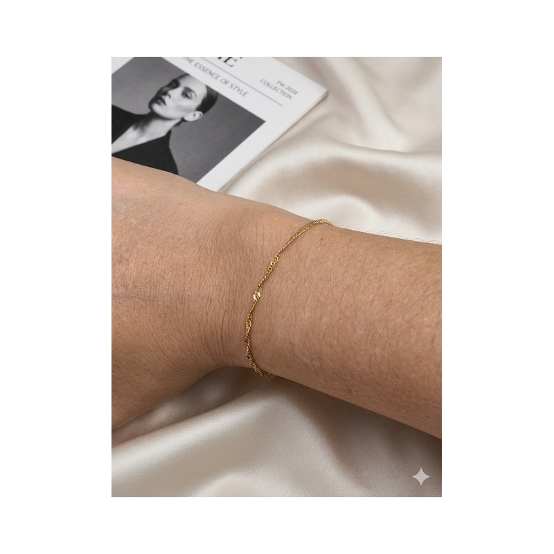 Pulseira no aço inoxidavel banhado a ouro